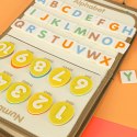 Tablica manipulacyjna sensoryczna montessori walizka dinozaury Kik Sp. z o. o. Sp. k.